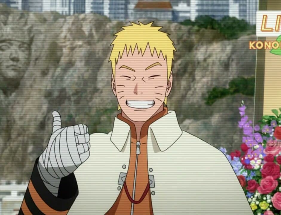 Close de Naruto Uzumaki como Sétimo Hokage, com cabelo curto, sorrindo de olhos fechados e fazendo um sinal de positivo com a mão enfaixada. Ao fundo, vê-se o Monumento Hokage esculpido na montanha de Konoha.